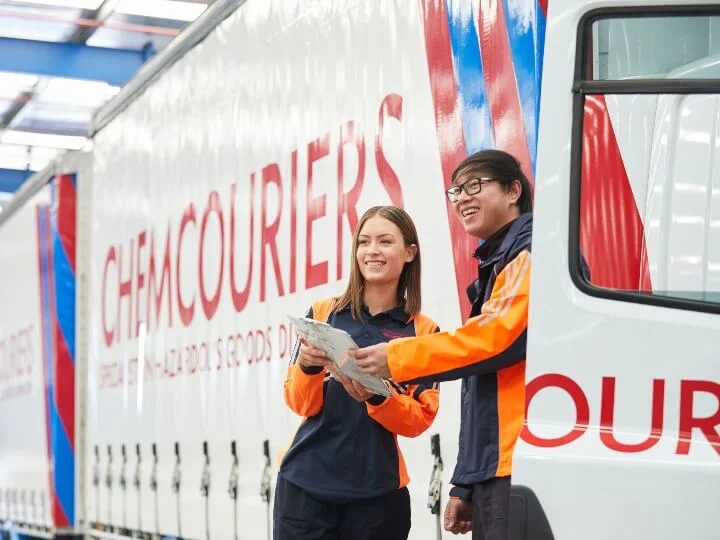 Chemcouriers team members standing in depot
